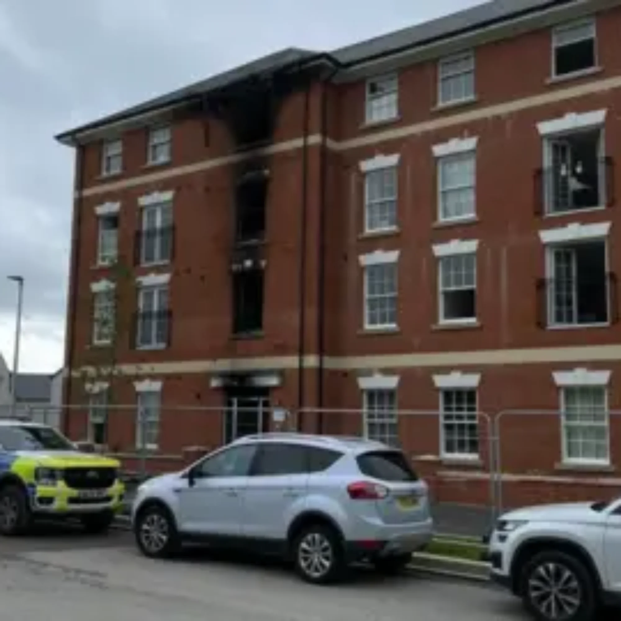 Families rescued after fire breaks out at Sherford flats