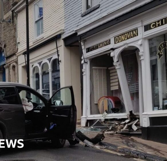 Car crash causes damage to historic Devon shopfront