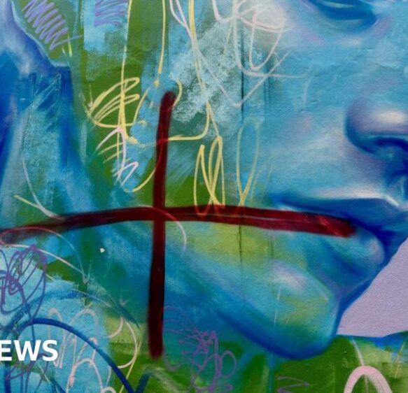 Weston-super-Mare street art graffitied with red crosses