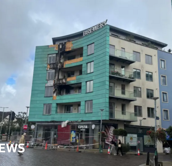 Dorchester flats fire likely caused by batteries in bin