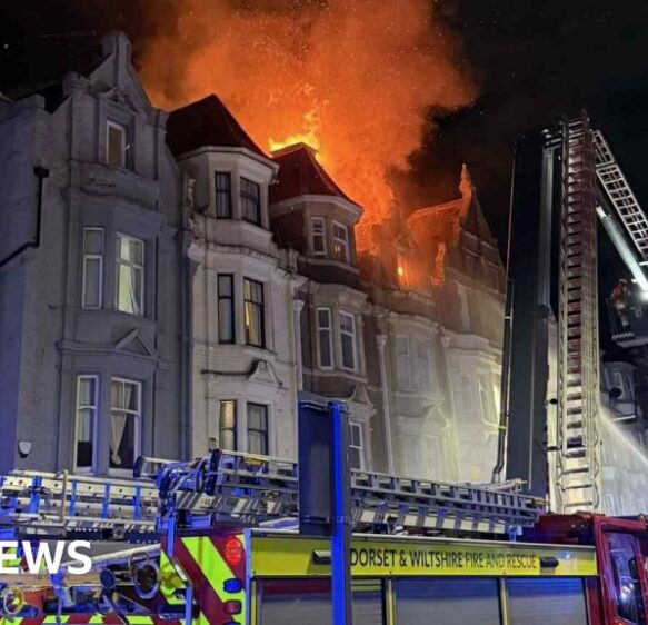 Dozens of firefighters tackle flat fire above Bournemouth shop