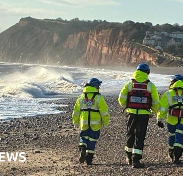 Search for two men missing after Christmas Day swim called off