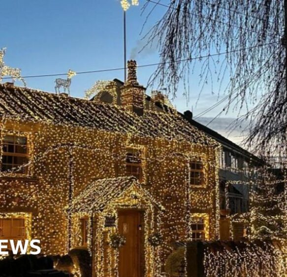 Thousands of Christmas lights and Pride flags