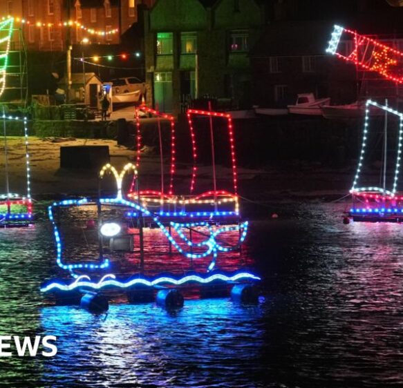Mousehole festive lights team battle stormy conditions