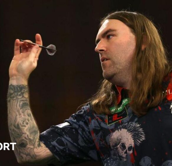 World Darts Championship: Luke Littler’s semi-final opponent Ryan Searle on rare eye condition