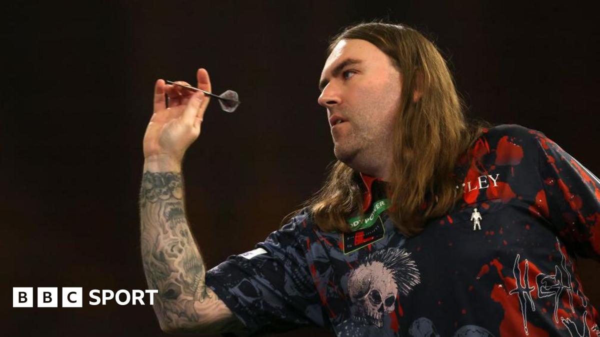 You are currently viewing World Darts Championship: Luke Littler’s semi-final opponent Ryan Searle on rare eye condition