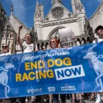 Campaigners march to end greyhound racing after 100 years of suffering